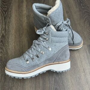 New! Gorgeous boots in brushed flannel, eye-catching fur, suede details.